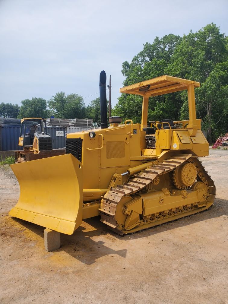Bulldozer after paint remediation